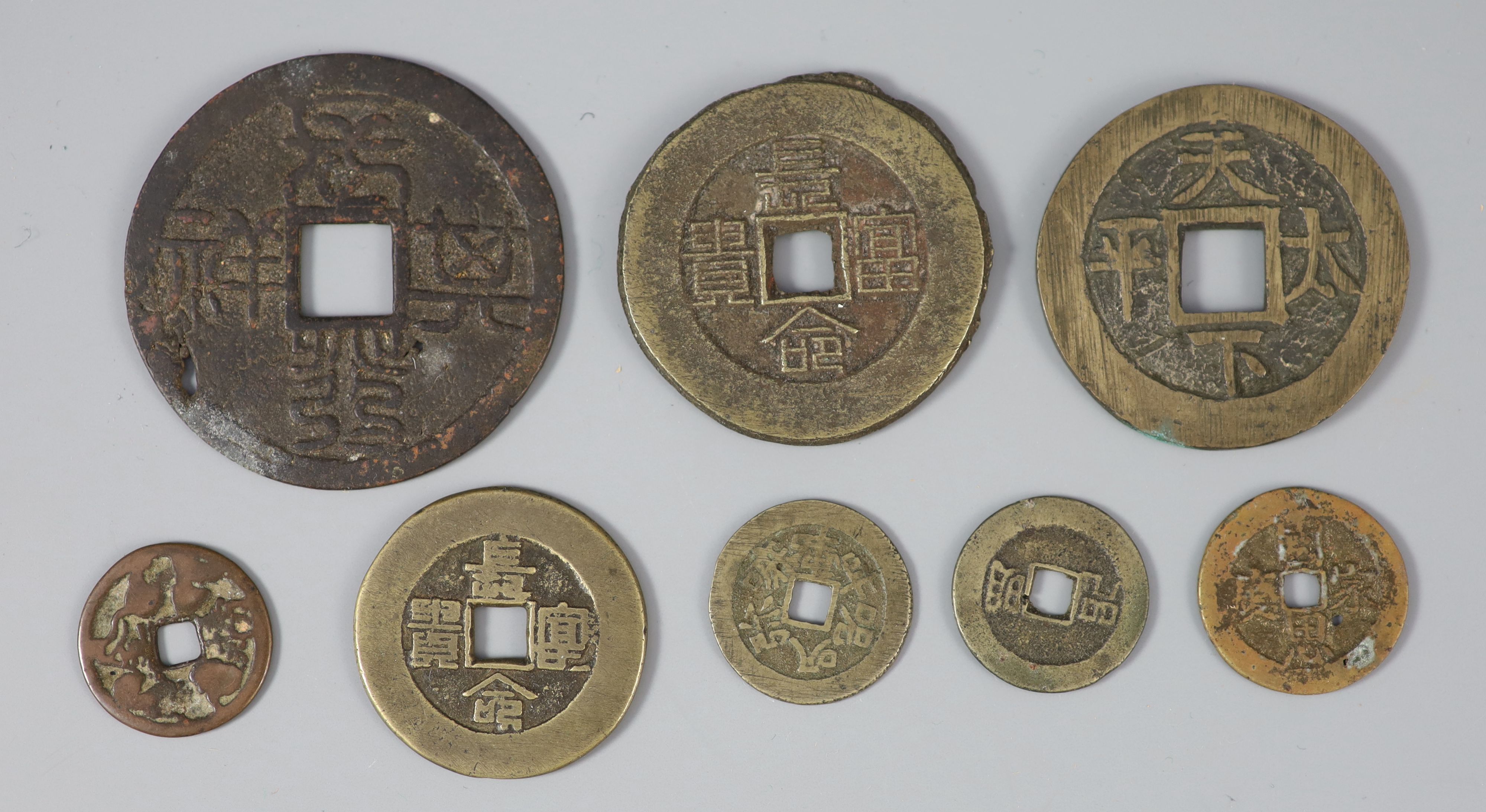 China, 8 bronze charms or amulets, Qing dynasty,